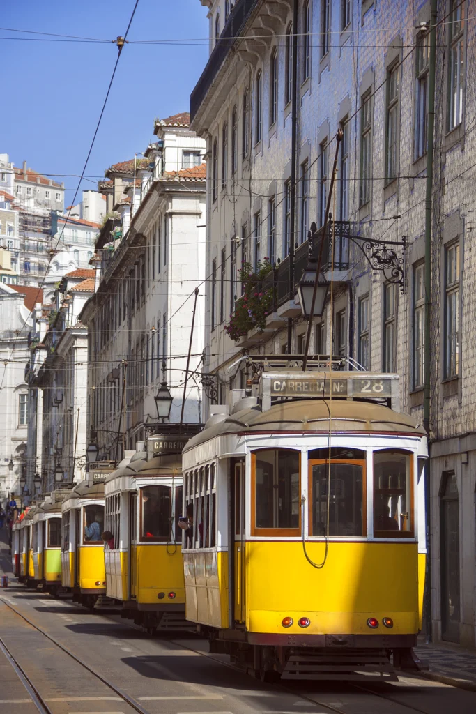 A day in the capital, without rush_many-yellow-tramways-parked-one-main-streets-city-lisbon-portugal A day in the capital, without rush.
